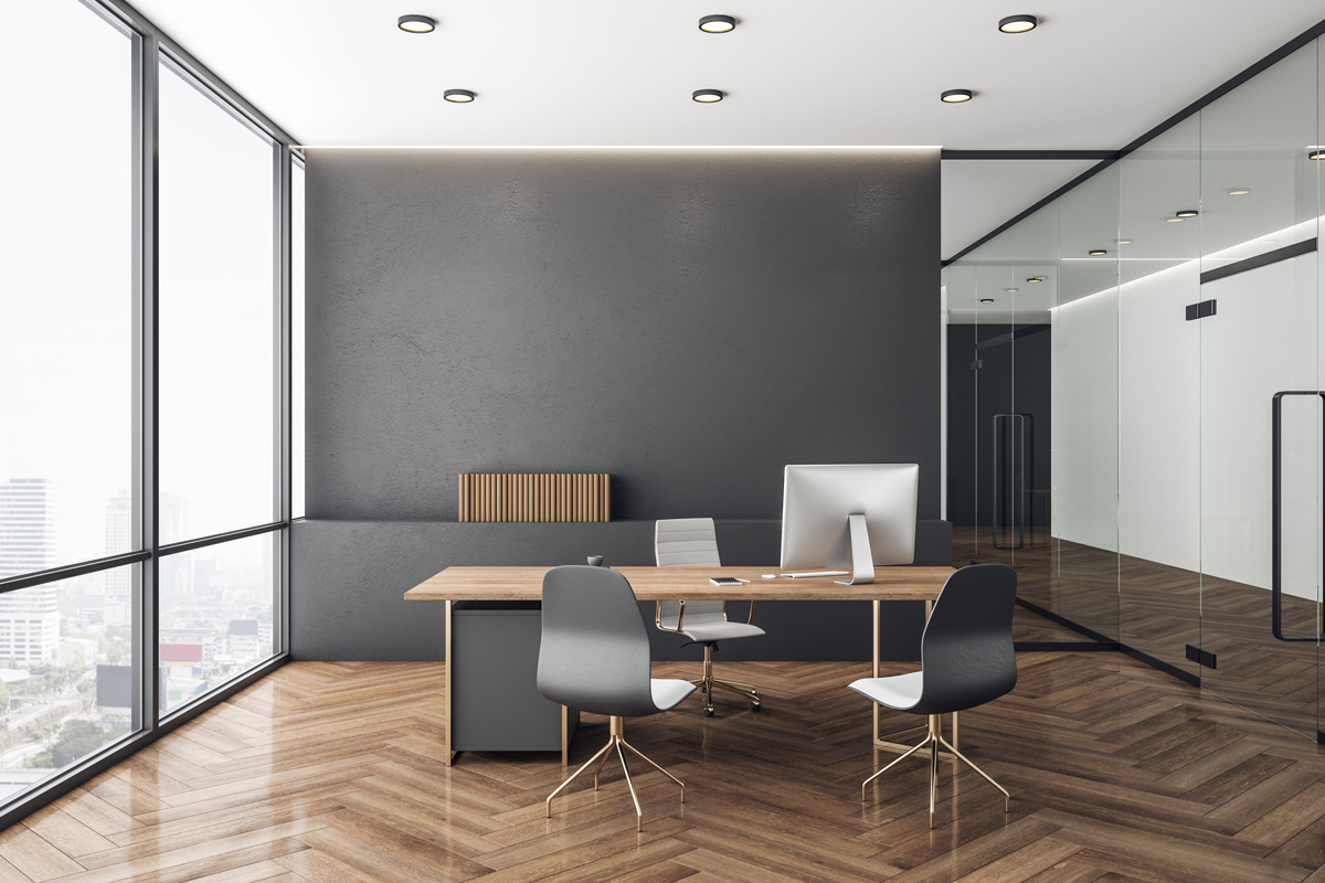 A modern office space with two chairs and a wooden desk in El Paso.